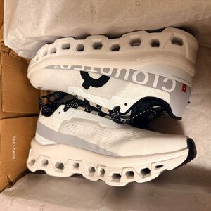 On Cloud Cloudmaster Women’s Running Shoes in Black and White